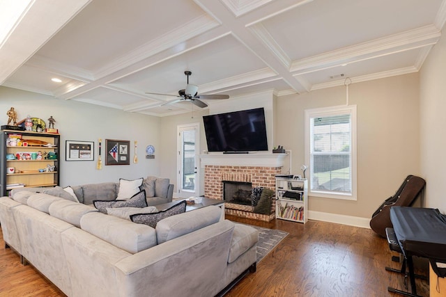 719 Nuttall St, Evans, GA 30809 - living room featuring wood finished floors, coffered ceiling, beam ceiling, ceiling fan, and a brick fireplace