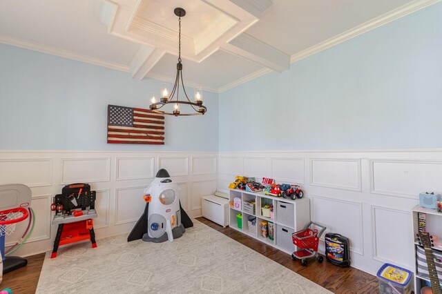 719 Nuttall St, Evans, GA 30809 - rec room featuring a decorative wall, a chandelier, wood finished floors, ornamental molding, and a wainscoted wall