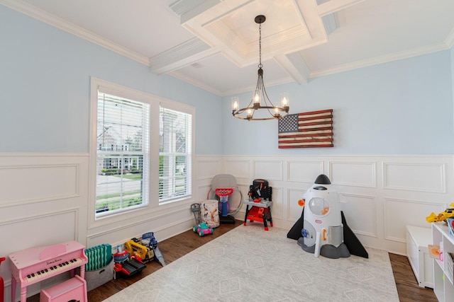 719 Nuttall St, Evans, GA 30809 - playroom with a decorative wall, a chandelier, dark wood finished floors, beamed ceiling, and ornamental molding