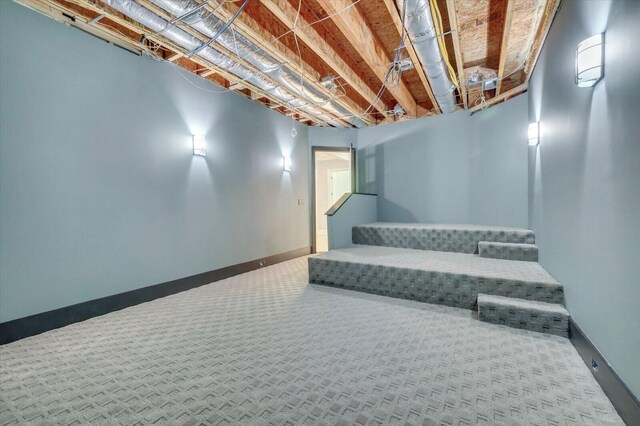 basement featuring carpet flooring