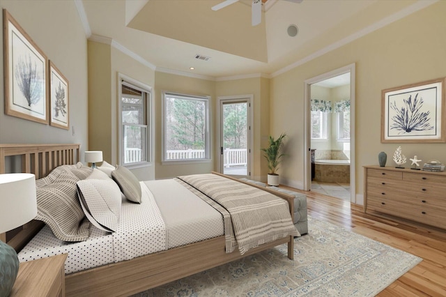 bedroom with ensuite bath, ceiling fan, light hardwood / wood-style floors, and ornamental molding