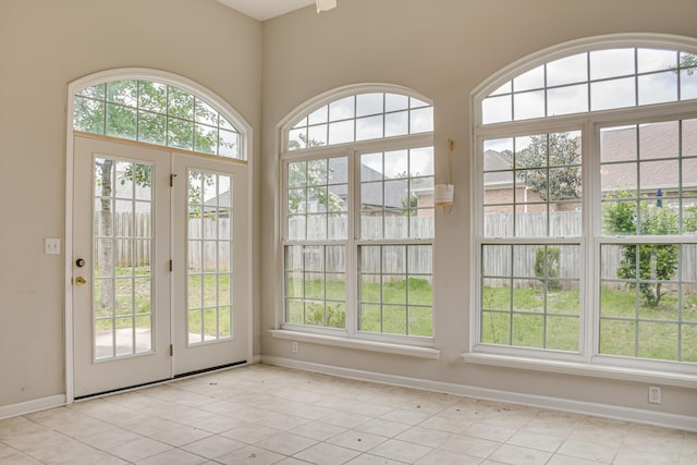 215 Mineral Ct, Evans, GA 30809 - doorway with healthy amount of natural light and light tile patterned flooring