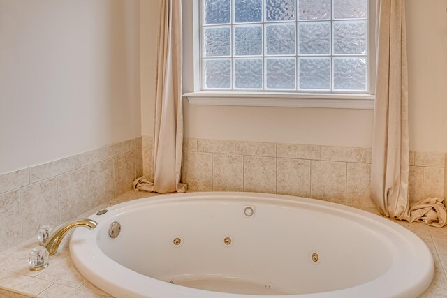 215 Mineral Ct, Evans, GA 30809 - bathroom with a tub with jets
