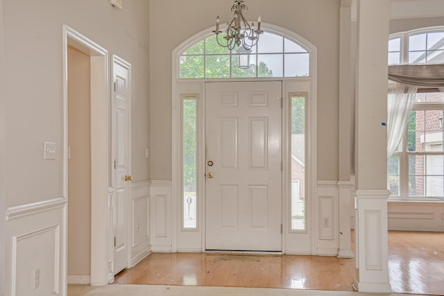 215 Mineral Ct, Evans, GA 30809 - entryway with a chandelier, plenty of natural light, and light wood-style floors