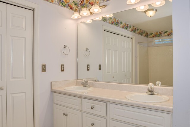 215 Mineral Ct, Evans, GA 30809 - full bath featuring a closet, double vanity, and a shower