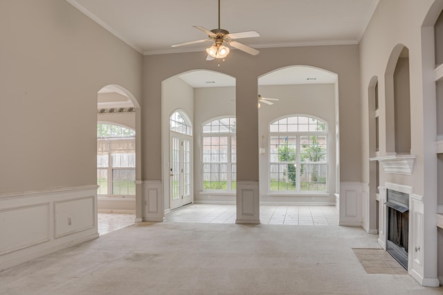 215 Mineral Ct, Evans, GA 30809 - entryway with a ceiling fan, light colored carpet, plenty of natural light, a decorative wall, and ornamental molding