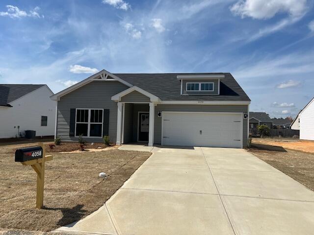 view of front of home with an attached garage and driveway