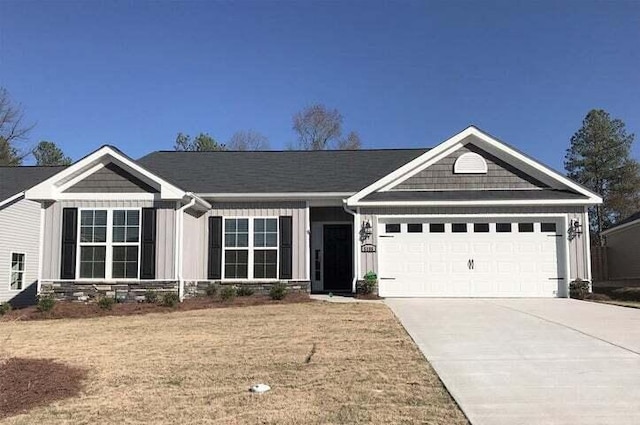 5186 Copse Dr, Augusta, GA 30909 - single story home featuring board and batten siding, concrete driveway, and an attached garage