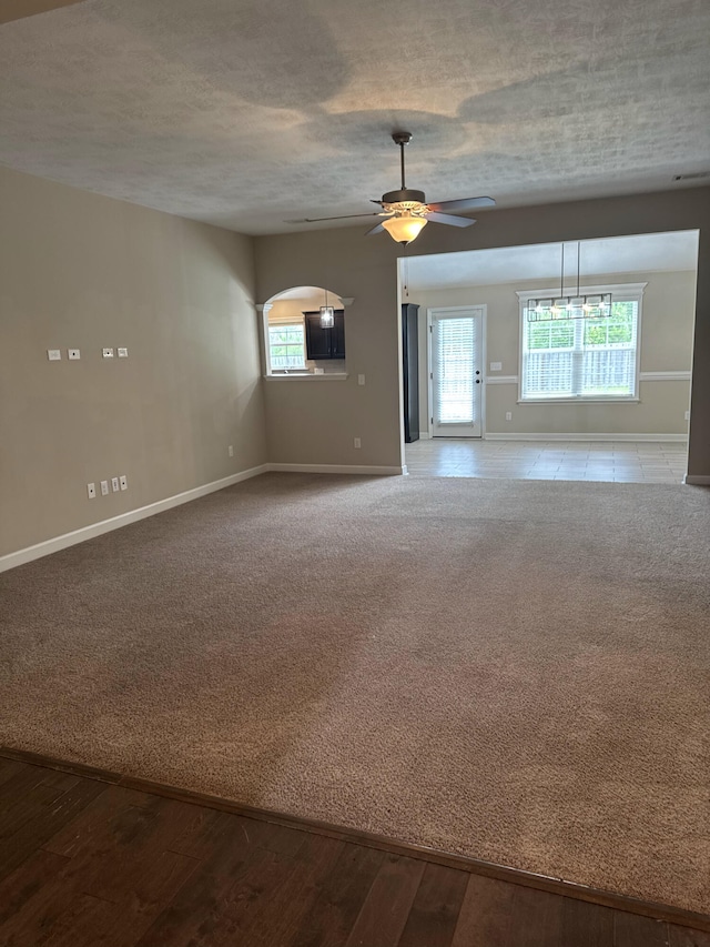 5186 Copse Dr, Augusta, GA 30909 - unfurnished room featuring plenty of natural light, a ceiling fan, a textured ceiling, and wood finished floors
