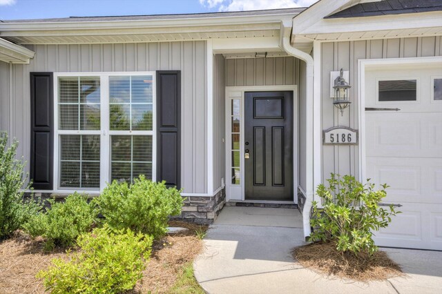 5186 Copse Dr, Augusta, GA 30909 - doorway to property featuring a garage