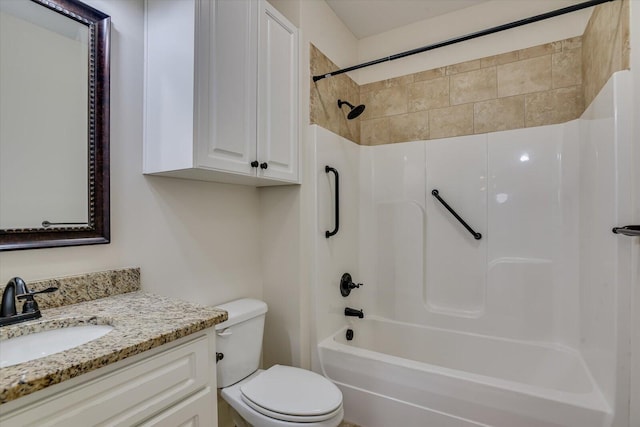 full bathroom featuring vanity, shower / bathtub combination, and toilet