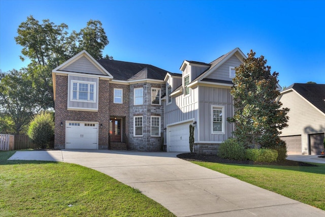 view of front facade with a garage and a front lawn