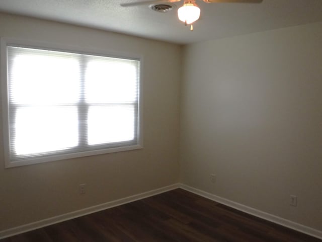 402 Parliment Rd, Martinez, GA 30907 - spare room with ceiling fan and dark wood-style flooring