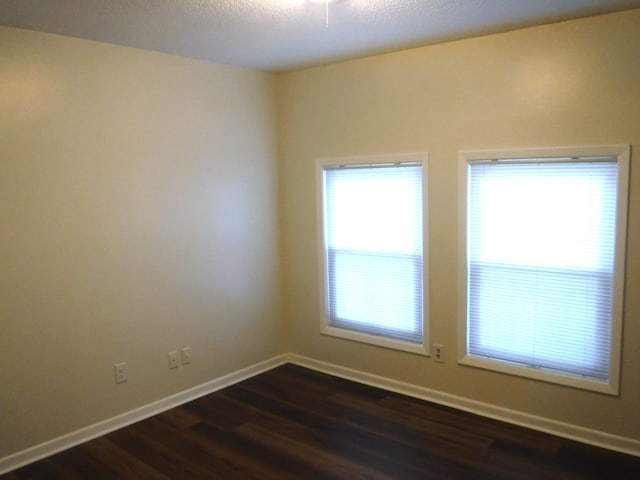 402 Parliment Rd, Martinez, GA 30907 - unfurnished room featuring dark wood-style flooring and baseboards