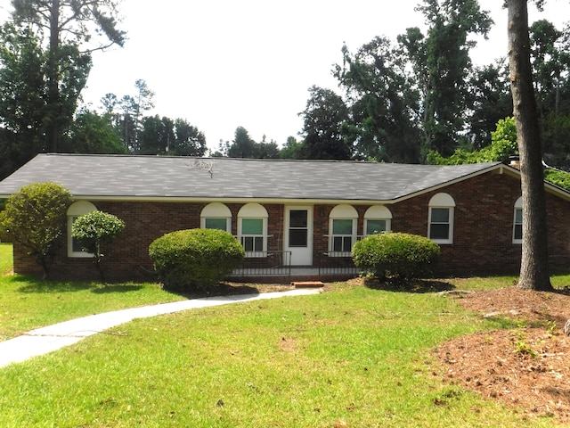 402 Parliment Rd, Martinez, GA 30907 - single story home with a front yard, brick siding, and a porch