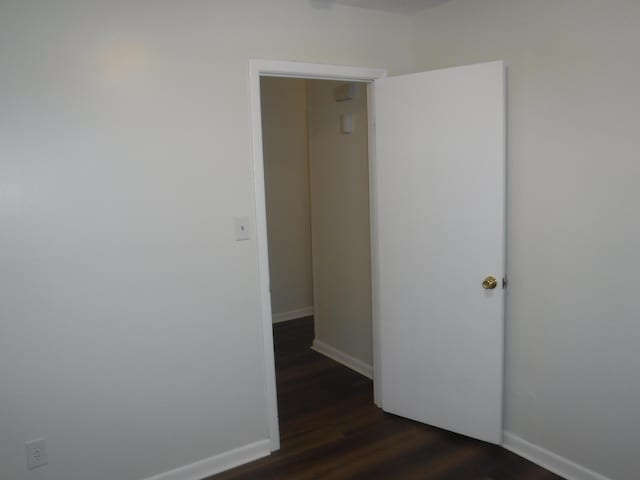 402 Parliment Rd, Martinez, GA 30907 - empty room with dark wood-style floors and baseboards