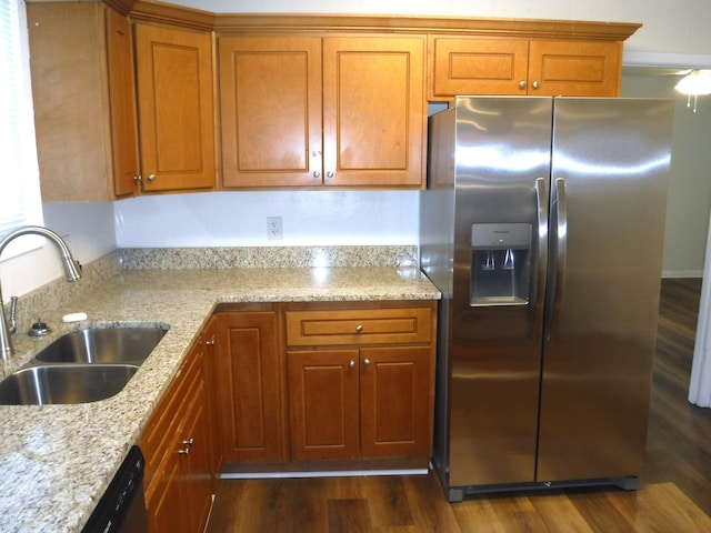 402 Parliment Rd, Martinez, GA 30907 - kitchen with stainless steel refrigerator with ice dispenser, brown cabinets, dark wood-style floors, and light stone countertops