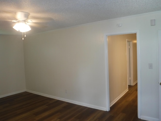 402 Parliment Rd, Martinez, GA 30907 - empty room featuring dark wood-style floors, a textured ceiling, a ceiling fan, and ornamental molding