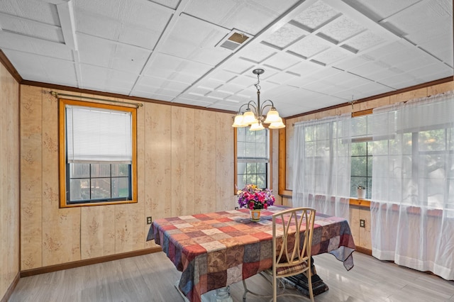 3626 Langdon Dr, Augusta, GA 30906 - dining space with light wood-style flooring, a chandelier, baseboards, and ornamental molding