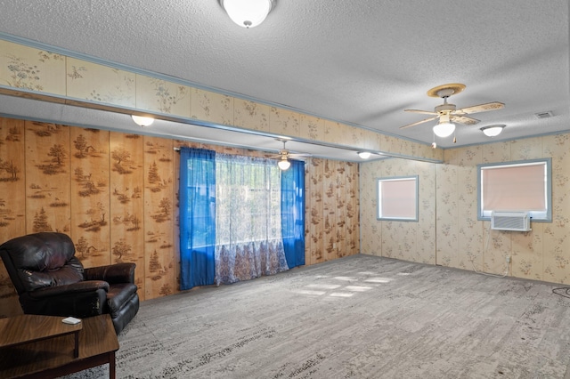 3626 Langdon Dr, Augusta, GA 30906 - unfurnished room featuring a textured ceiling, wallpapered walls, wood finished floors, and a ceiling fan