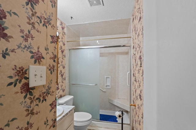 3626 Langdon Dr, Augusta, GA 30906 - full bathroom with toilet, vanity, a stall shower, and a textured ceiling