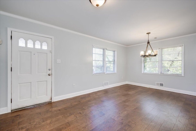 entrance foyer featuring baseboards, visible vents, and dark wood-type flooring