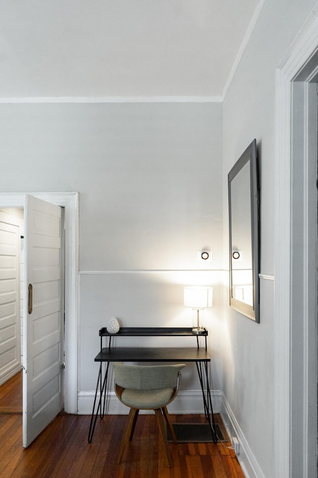 office area with crown molding and dark hardwood / wood-style flooring