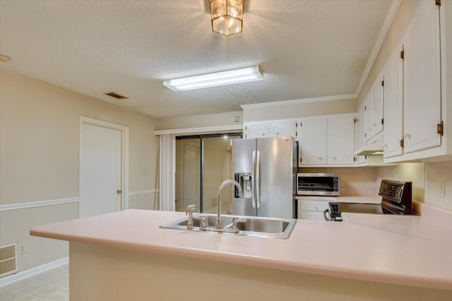 kitchen featuring a sink, under cabinet range hood, white cabinetry, appliances with stainless steel finishes, and light countertops