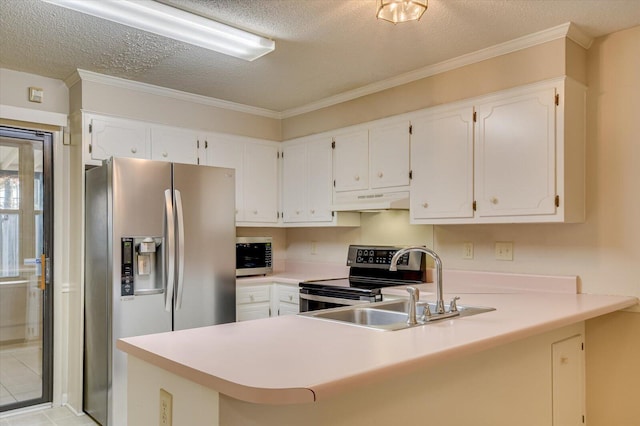 kitchen with a peninsula, a sink, stainless steel appliances, under cabinet range hood, and a textured ceiling