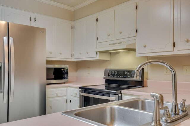 kitchen featuring under cabinet range hood, stainless steel appliances, ornamental molding, and white cabinetry