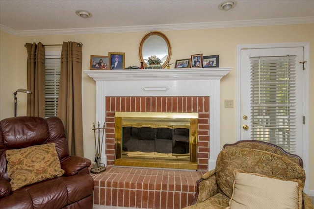 sitting room with a brick fireplace and ornamental molding