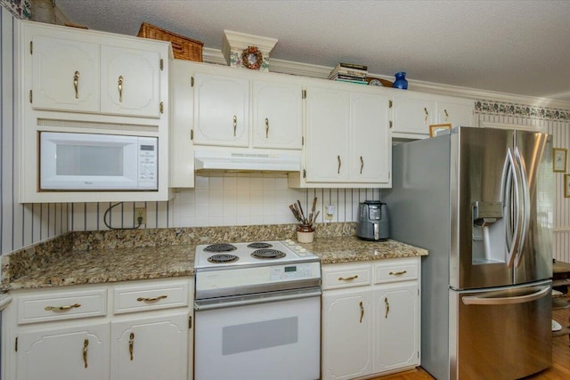kitchen featuring white cabinetry, under cabinet range hood, and white appliances