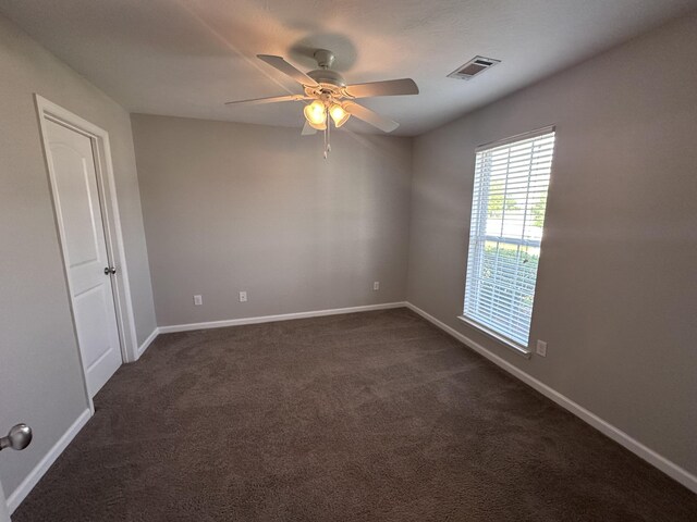 3035 Gobbler Ct, Aiken, SC 29801 - spare room with ceiling fan and dark colored carpet