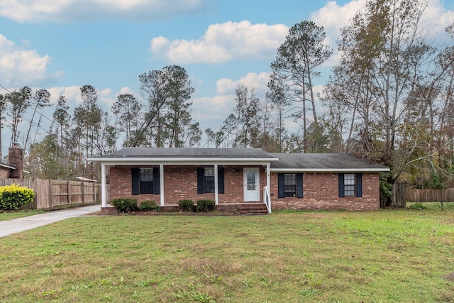 ranch-style house with a front lawn