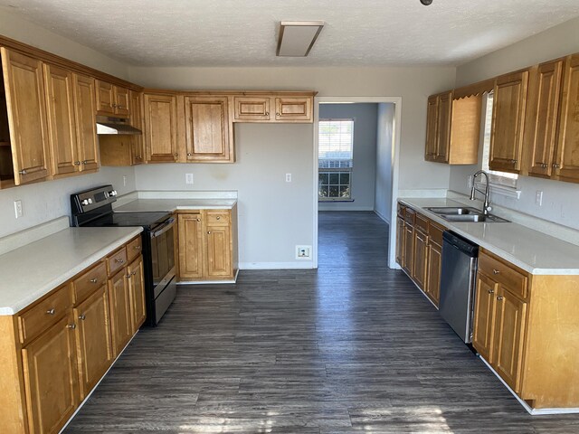 kitchen featuring black range with electric stovetop, sink, stainless steel dishwasher, dark hardwood / wood-style floors, and a textured ceiling