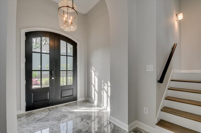 2417 Wilkshire Dr, Augusta, GA 30904 - foyer with marble finish floor, baseboards, arched walkways, and french doors