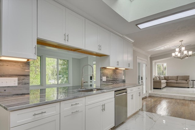 2417 Wilkshire Dr, Augusta, GA 30904 - kitchen with dishwasher, ornamental molding, white cabinetry, a sink, and light stone counters