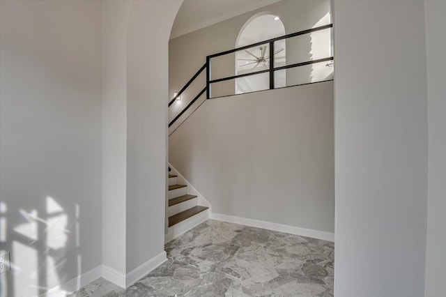 2417 Wilkshire Dr, Augusta, GA 30904 - staircase featuring marble finish floor, baseboards, arched walkways, and ornamental molding
