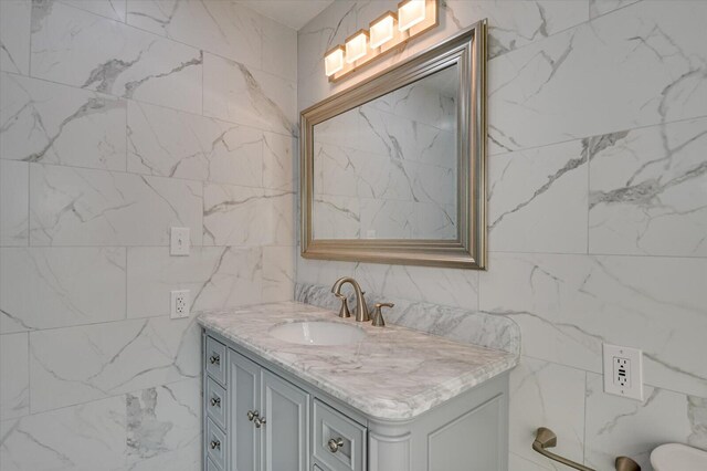 2417 Wilkshire Dr, Augusta, GA 30904 - bathroom featuring vanity and tile walls