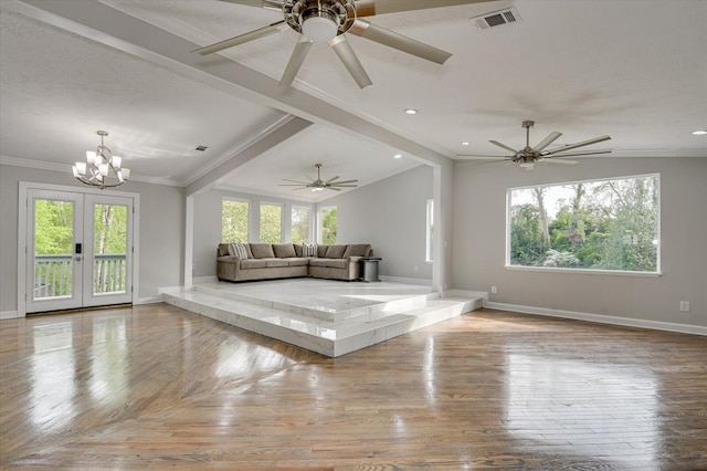 2417 Wilkshire Dr, Augusta, GA 30904 - unfurnished living room featuring wood finished floors, plenty of natural light, and visible vents