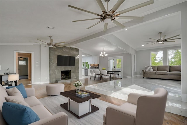 2417 Wilkshire Dr, Augusta, GA 30904 - living area featuring vaulted ceiling with beams, visible vents, crown molding, and ceiling fan with notable chandelier