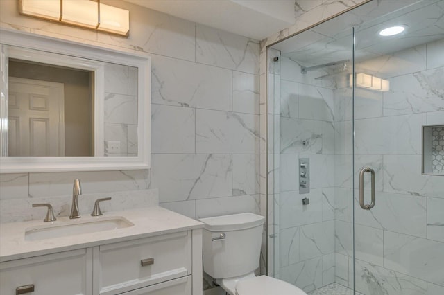 2417 Wilkshire Dr, Augusta, GA 30904 - bathroom featuring a stall shower, tile walls, toilet, and vanity