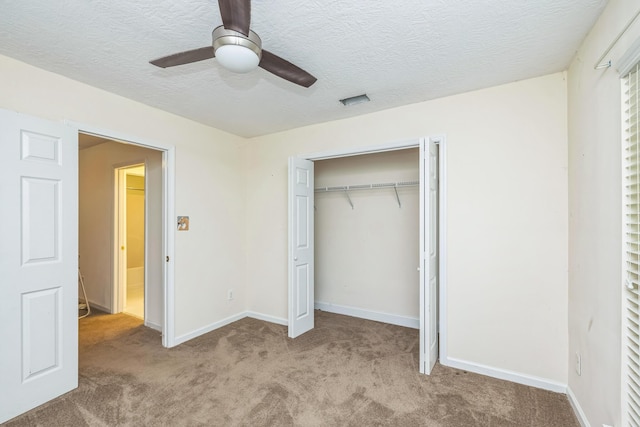 3758 Boulder Trl, Augusta, GA 30907 - unfurnished bedroom with carpet, a textured ceiling, a closet, and ceiling fan