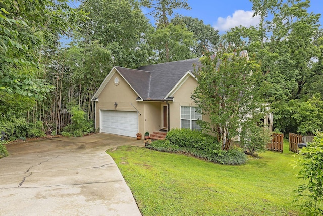 3758 Boulder Trl, Augusta, GA 30907 - view of front facade with stucco siding, driveway, an attached garage, and roof with shingles