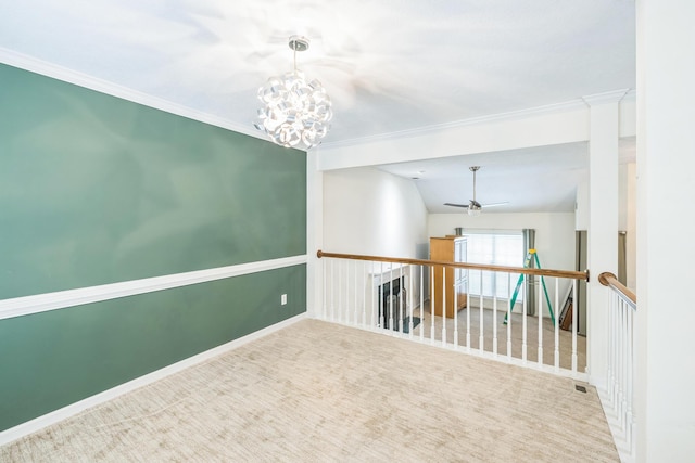 3758 Boulder Trl, Augusta, GA 30907 - carpeted empty room featuring a chandelier, a ceiling fan, and crown molding