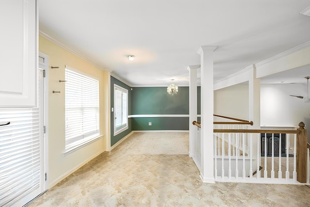 3758 Boulder Trl, Augusta, GA 30907 - spare room featuring crown molding, carpet floors, and a chandelier