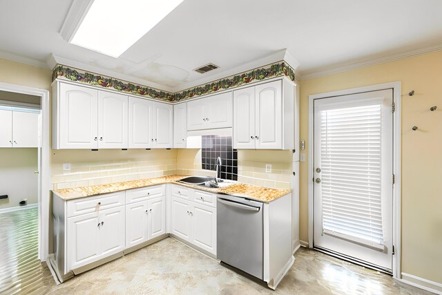 3758 Boulder Trl, Augusta, GA 30907 - kitchen with stainless steel appliances, ornamental molding, white cabinetry, and light countertops