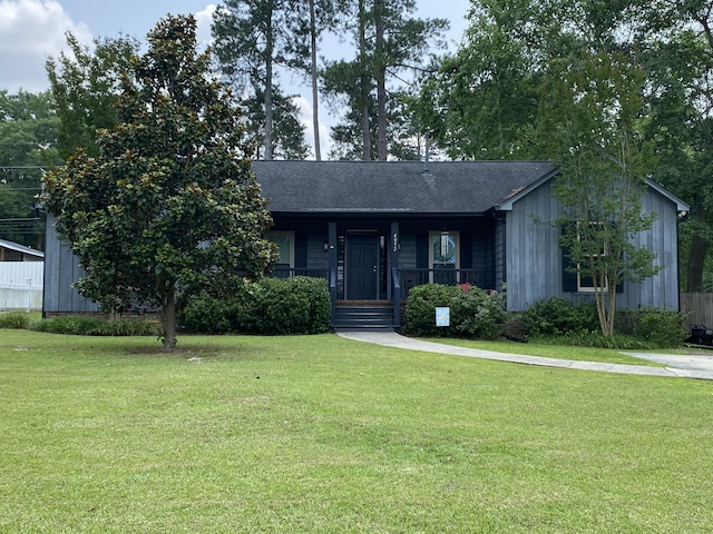 4092 Amherst Way, Martinez, GA 30907 - single story home with a front yard, a porch, and a shingled roof