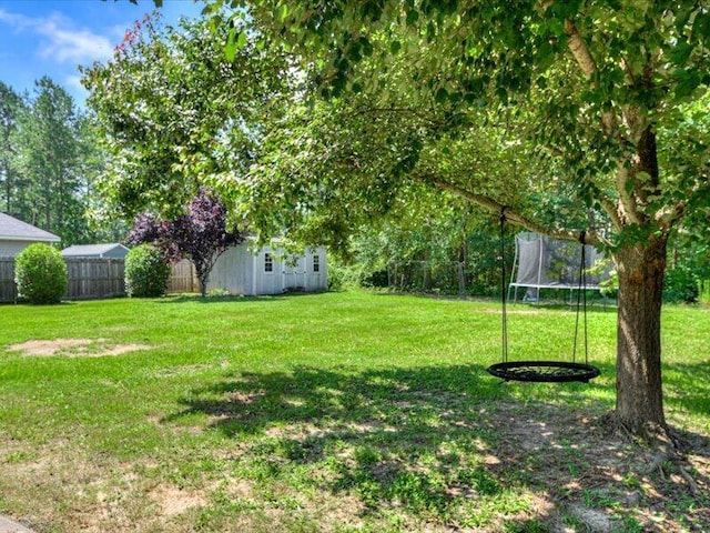 2084 Gardenview Dr, Graniteville, SC 29829 - view of yard featuring a trampoline and an outdoor structure