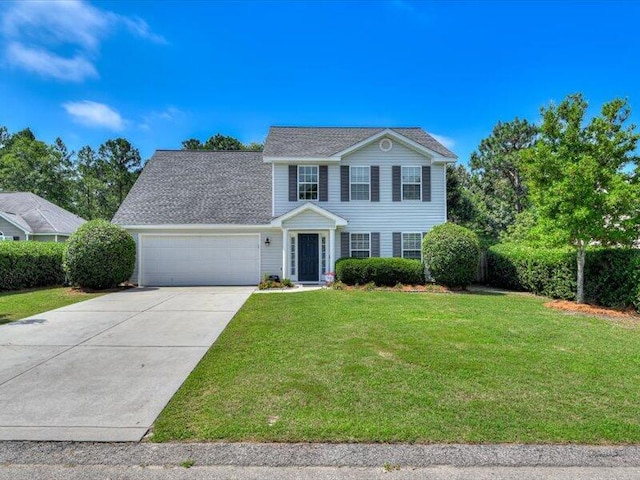 2084 Gardenview Dr, Graniteville, SC 29829 - view of front of house with an attached garage, driveway, and a front yard